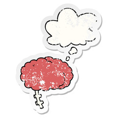 cartoon brain and thought bubble as a distressed worn sticker