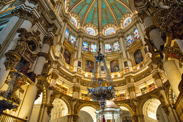 Fototapeta na wymiar Granada, Spain-October 15, 2018: Exquisite Interiors of landmark Granada Royal Cathedral