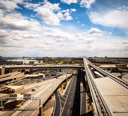 The airport in Phoenix, Arizona has a unique parking structure in that it is layers of circular drive taking you to different levels to park your car. You can look between the layers to see a vista of