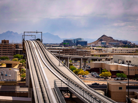 The Airport In Phoenix, Arizona Has A Unique Parking Structure In That It Is Layers Of Circular Drive Taking You To Different Levels To Park Your Car. You Can Look Between The Layers To See A Vista Of