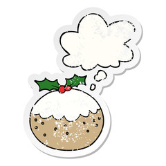 cartoon christmas pudding and thought bubble as a distressed worn sticker
