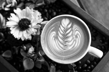 Black and white shot of coffee latte cup,aerial view