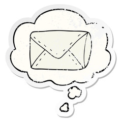 cartoon envelope and thought bubble as a distressed worn sticker