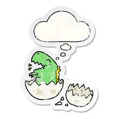 cartoon dinosaur hatching and thought bubble as a distressed worn sticker