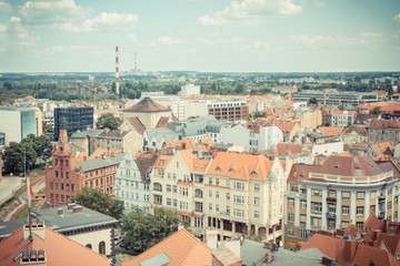 Poznan, Poland - June 28, 2016: Vintage photo, View on old and modern buildings in polish town...