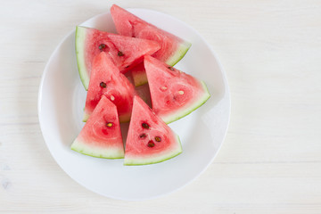 slices of watermelon on plate. copy space