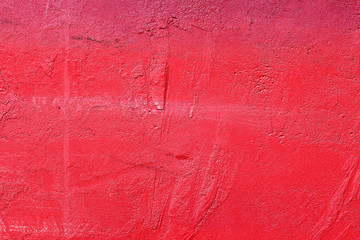 Old style red concrete wall close-up texture background
