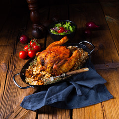 Grilled spicy chicken with barley groats and mushrooms