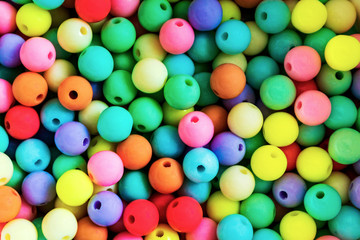Bright colorful small ball or many colorful plastic balls. Abstract background. Sweet nice background. Color concept