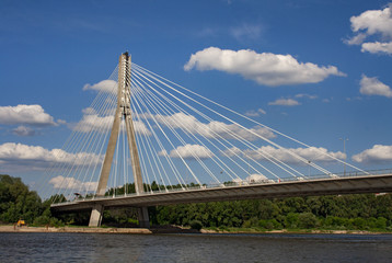 Fototapeta na wymiar Most Świętokrzyski w Warszawie na tle Stadionu Narodowego
