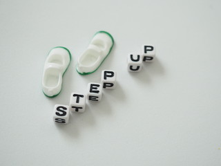 おもちゃの靴とステップアップの単語