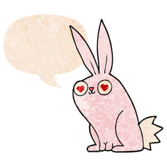 cartoon bunny rabbit in love and speech bubble in retro textured style