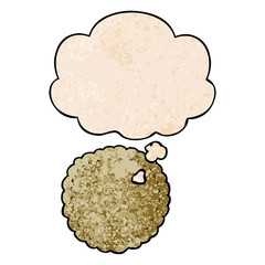 cartoon biscuit and thought bubble in grunge texture pattern style