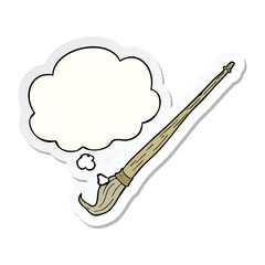 cartoon paint brush and thought bubble as a printed sticker
