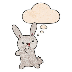 cartoon rabbit and thought bubble in grunge texture pattern style