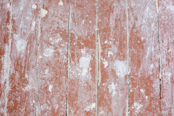 Old vintage brown painted wooden planks. Rustic background texture. Floor after renovation with whitewash.