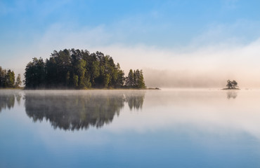 Peaceful and simple view from island at the lake in Liesjärvi National Park, Finland.