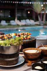 Barbecue party near pool