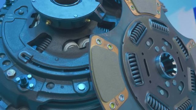 New car clutch basket and disc is show in the exhibition. Shot in motion