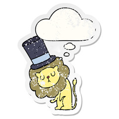 cute cartoon lion wearing top hat and thought bubble as a distressed worn sticker