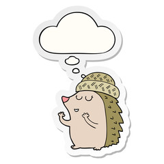 cartoon hedgehog wearing hat and thought bubble as a printed sticker