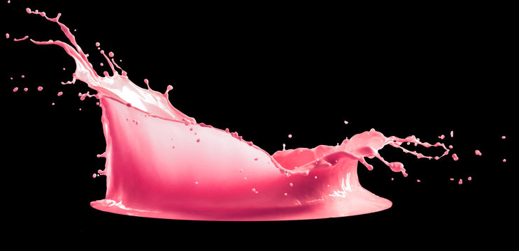 pink paint splash isolated on black background