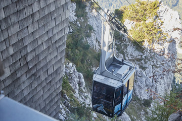 Cable car in the mountains and view from the height