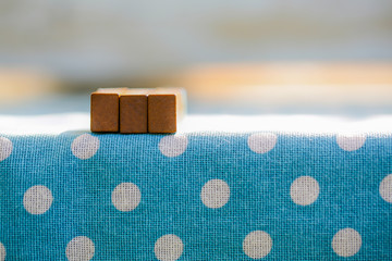 space stamp wooden on dot pattern blue cloth vintage style