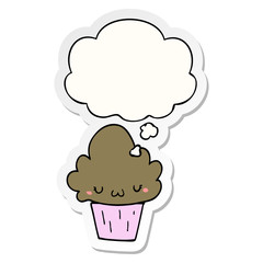 cartoon cupcake with face and thought bubble as a printed sticker