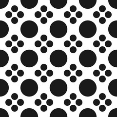 High quality vector seamless pattern made with black circles in two different size arranged to look clean and elegant
