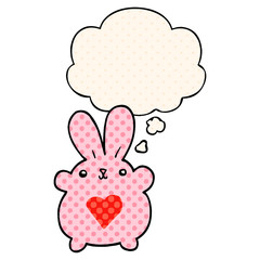 cute cartoon rabbit with love heart and thought bubble in comic book style