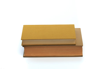 vintage old hardcover books on white background