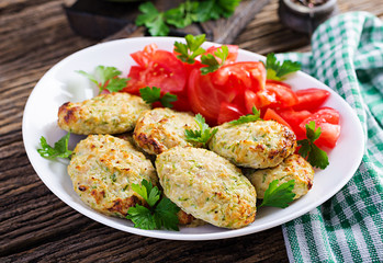 Chicken cutlet with zucchini and tomatoes salad. Healthy food.