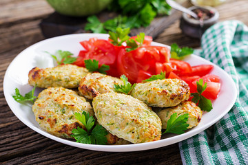 Chicken cutlet with zucchini and tomatoes salad. Healthy food.