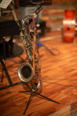 Saxophone standing on stand during music event
