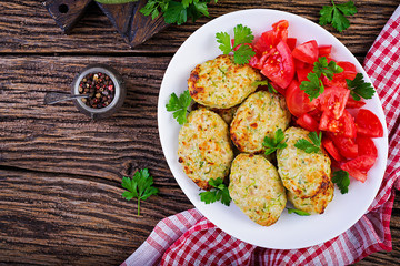 Chicken cutlet with zucchini and tomatoes salad. Healthy food. Top view