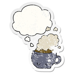 cute cartoon coffee cup and thought bubble as a distressed worn sticker