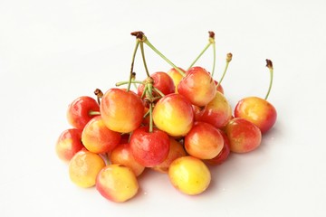 yellow and orange fruit of sweet cherry