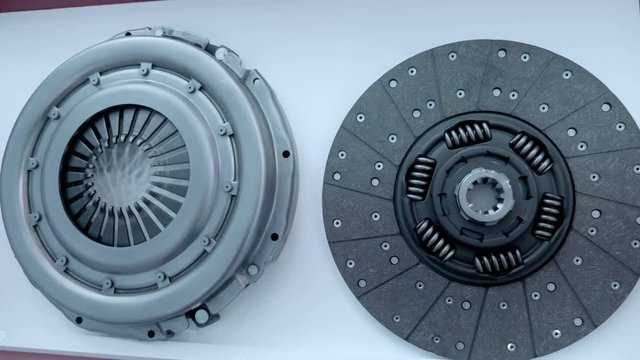 New car clutch basket and disc is show in the exhibition. Shot in motion