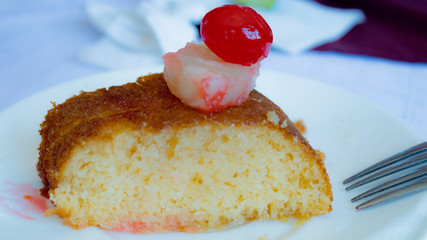 Delicious wine cake with cherry on top, homemade in M&eacute;xico.