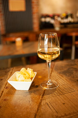 White wine aperitivo tasty food chips
