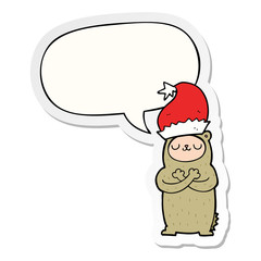cartoon bear wearing christmas hat and speech bubble sticker