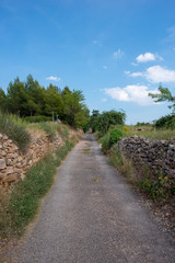 Rural road between mountains of the Sierra de Gudar, Valbona