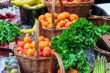 Fresh sweet orange apricots at the market