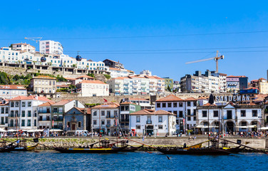 Fototapeta na wymiar Sandeman Port wine building on Diogo Leite Avenue in Vila Nova de Gaia city of Portugal