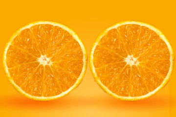 background of half cut orange on orange background