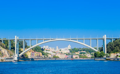 Arrabida Bridge in Porto Portugal, crossing the Douro River and linking Porto with Vila Nova de Gaia