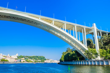 Arrabida Bridge in Porto Portugal, crossing the Douro River and linking Porto with Vila Nova de Gaia