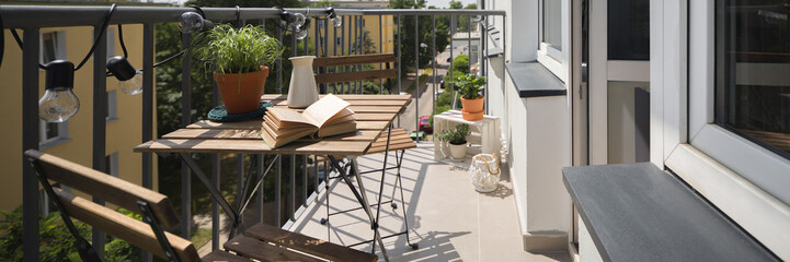 Balcony with wooden table