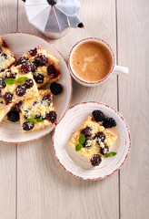 Blackberry and coconut crumble slices